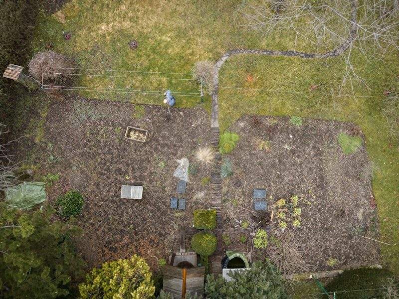 Cluttered yard before cleanup in Pacific Beach, CA